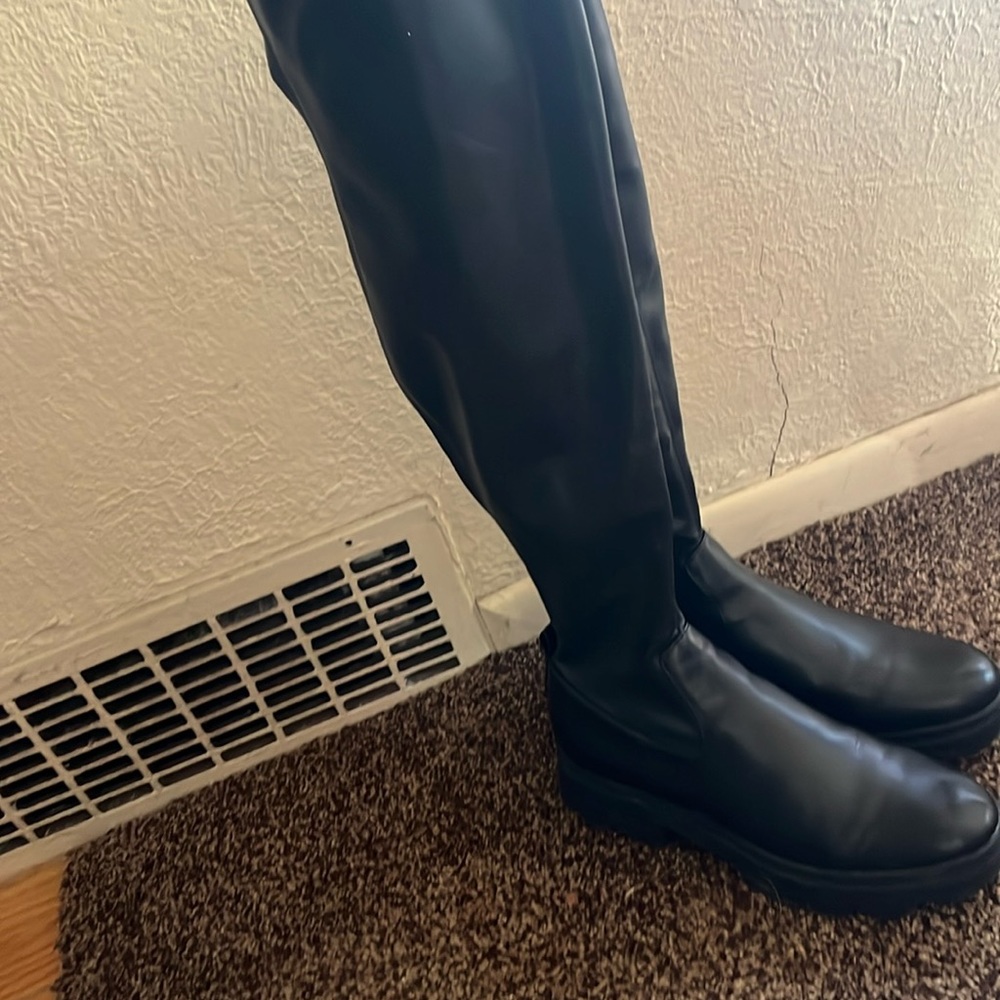 Over the knee length leather boots